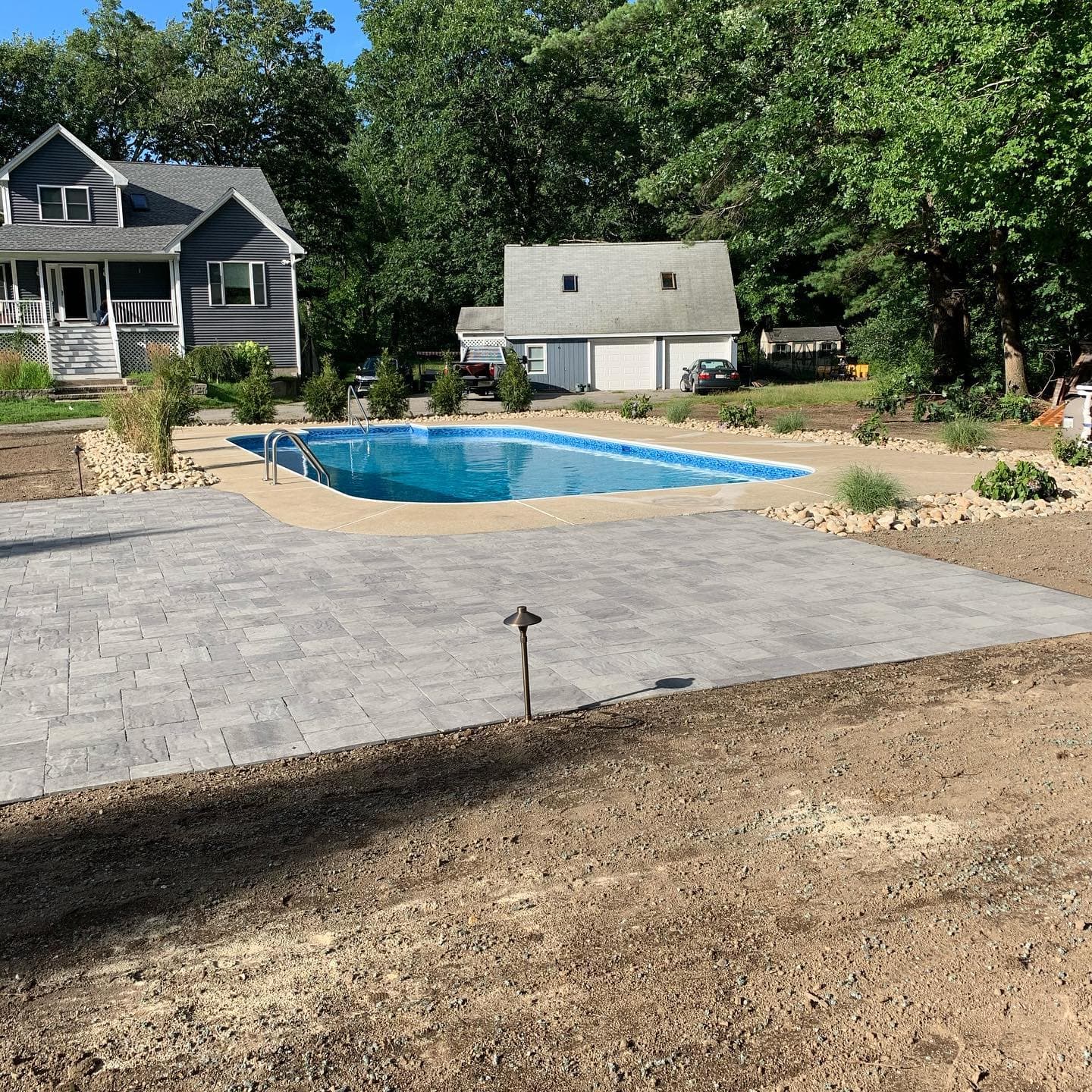 Rectangular pool with a wide paver deck