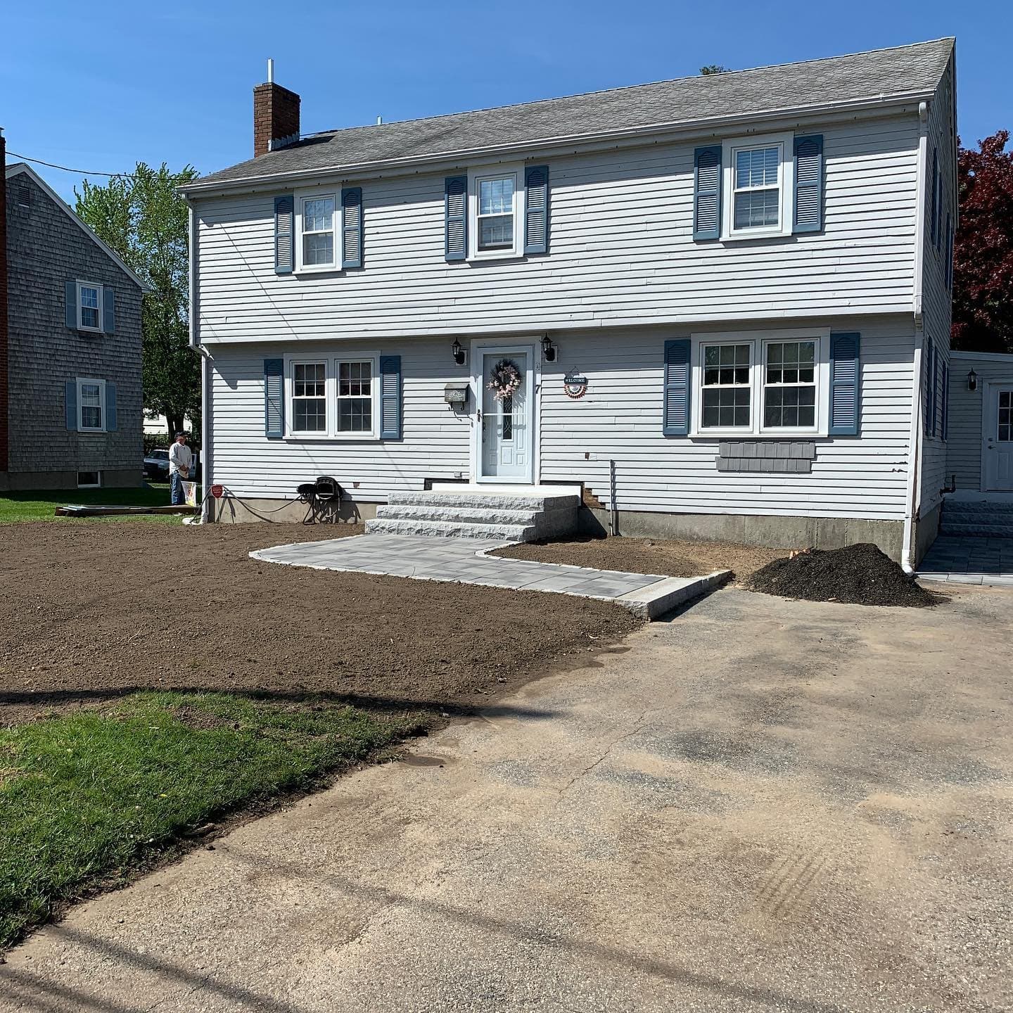 Front yard graded around a new walk