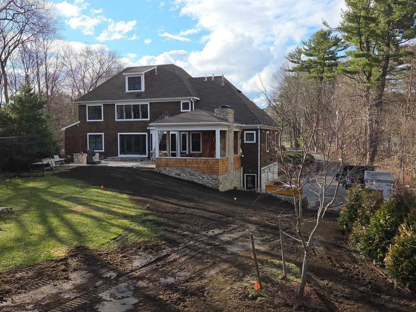 Graded yard with new plantings