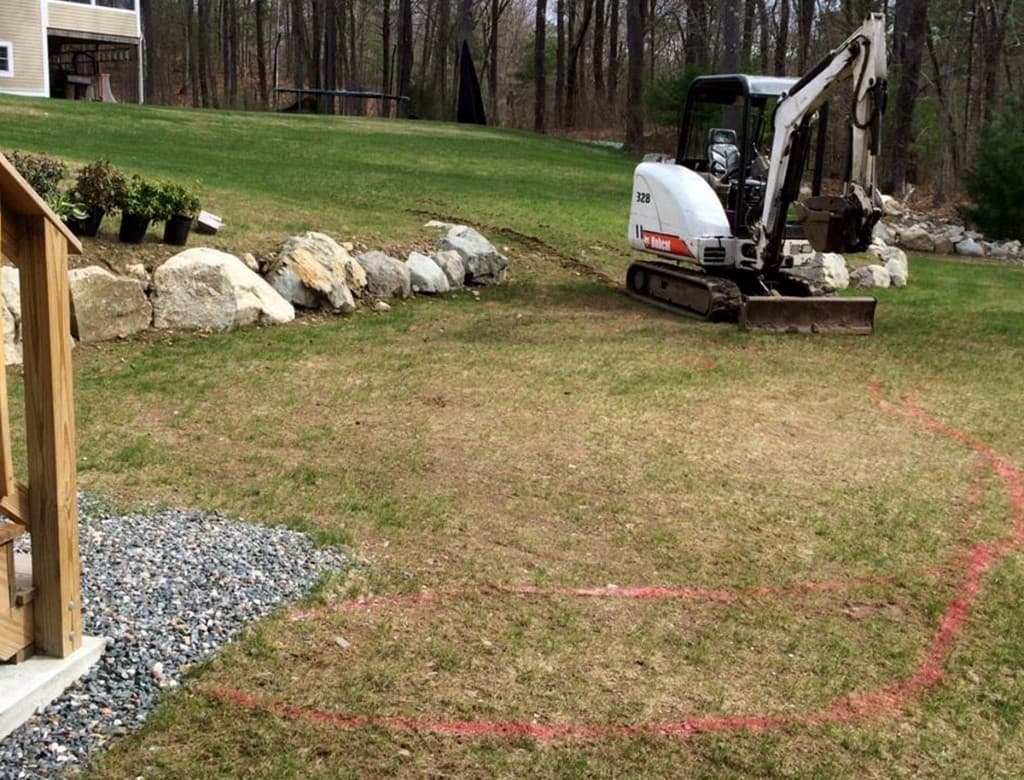 Middleton backyard before the patio, with excavation marked out