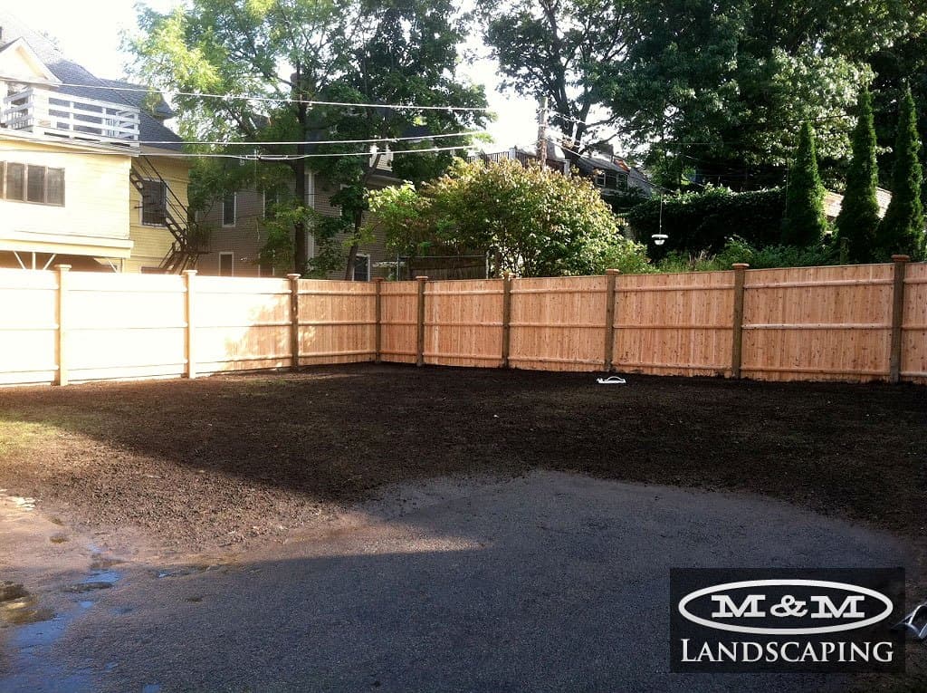 New cedar privacy fence around a backyard