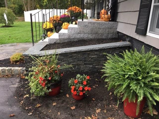 Fall mums and planters by new front steps