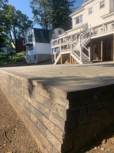 Retaining wall and steps behind a house